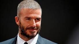 David Beckham pays $50m for full control of his brand business