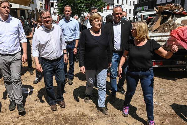 Merkel defends warning system and makes flood funding promise
