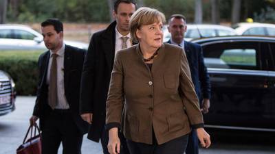 Angela Merkel urges compromise as coalition talks stall