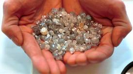 De Beers cuts 2015 diamond  target as demand for gems falls