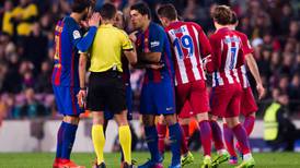 Nine-man Barcelona edge past Atletico into Copa final