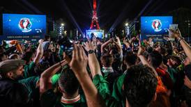 Euro 2016: Irish fans try to turn Eiffel Tower green, white and orange