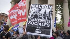 Macron provokes opponents on eve of protest marches