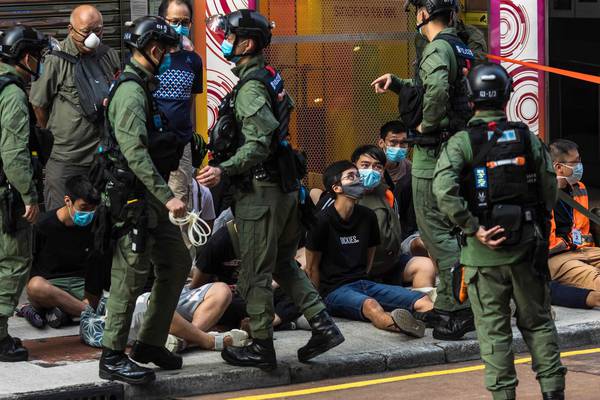 Hong Kong shocked after girl (12) pinned down and arrested