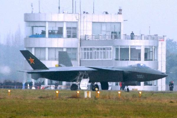 China unveils stealth jet    as navy assembles ‘first class’ fleet