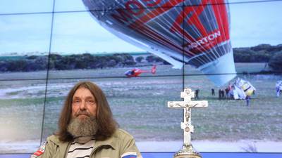 Russian priest in hot air balloon flies round world in record time