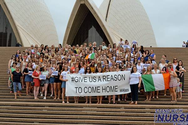 ‘Give us a reason to come home’: Irish nurses hold rally at Sydney Opera House