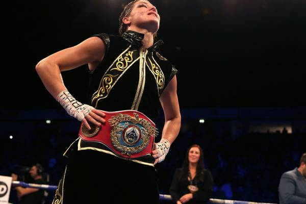 Business-like Katie Taylor becomes a two-weight world champion