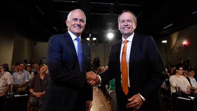 Australian vote: Week two marked by dog whistle and police raid