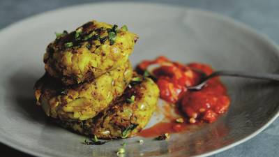 Aloo  tikki – potato fritters with sizzled tomatoes