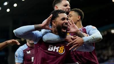 Douglas Luiz’s late penalty moves Aston Villa level on points with Liverpool at the top