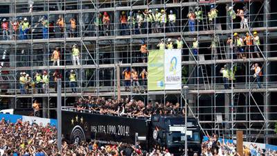 Return of Germany squad with  ‘Das Ding’ brings huge crowds to streets of Berlin