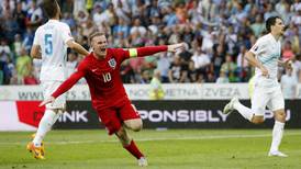 Wayne Rooney strikes late as England make it six from six