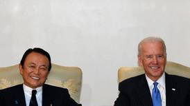 Biden urges Japan, China to lower tensions over air defence zone