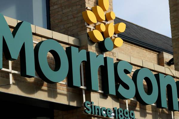 Morrisons reports rising half-year profit