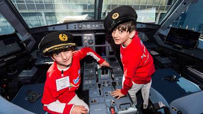 Former conjoined Cork twins operate Shannon airport for a day