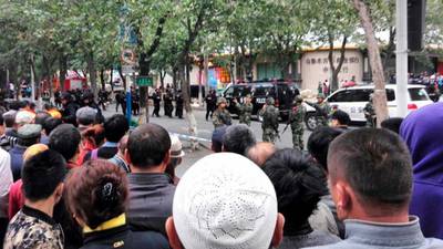 Car and bomb attack on market kills 31 in Xinjiang