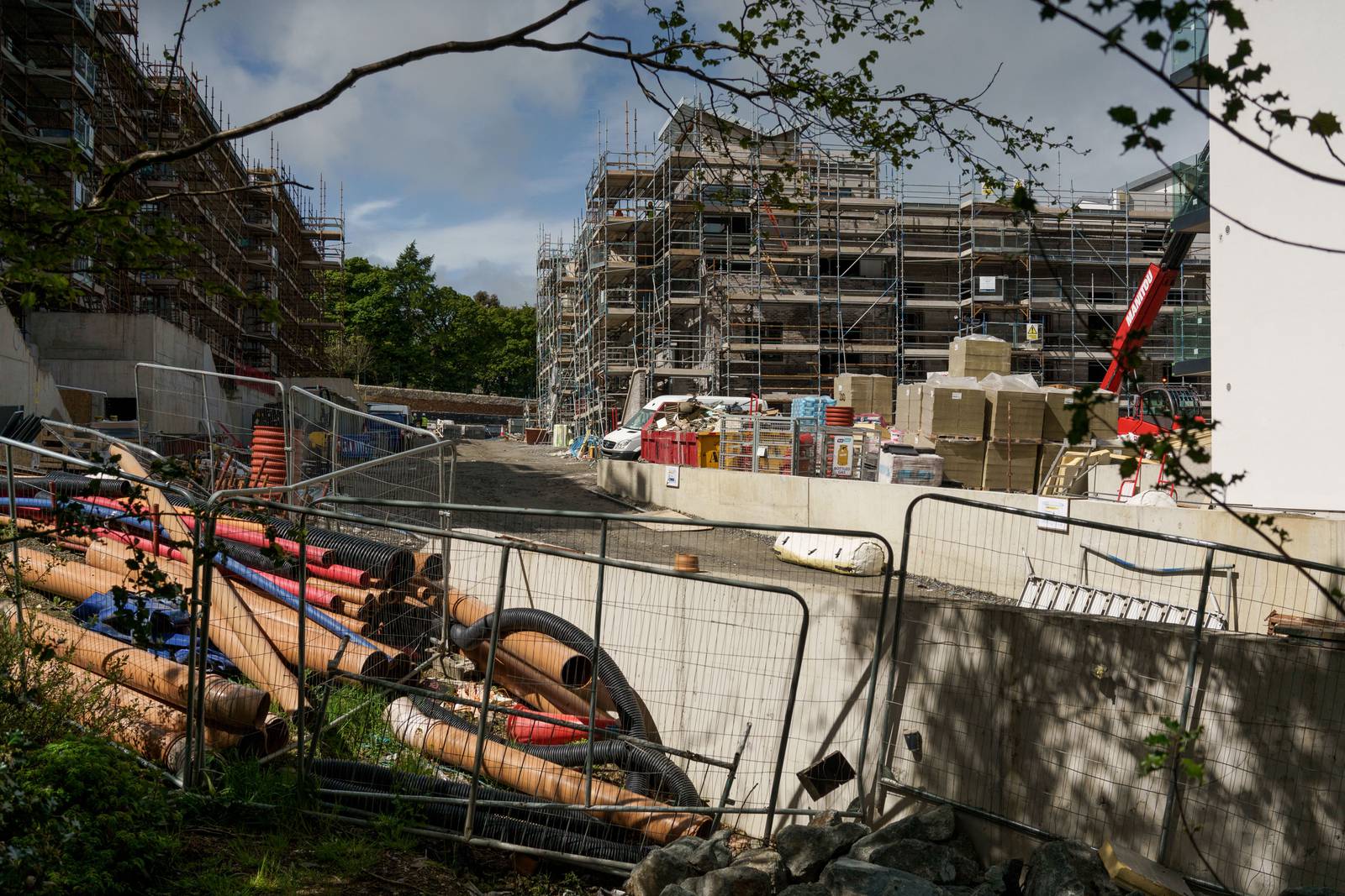 Scaffolding on a residential construction site in the Sandyford district of Dublin, Ireland, on Monday, May 10, 2021. The mass purchase of affordable houses  on the market for about 400,000 euros ($490,000)  set off a public firestorm and highlights the growing tension over the squeeze in urban housing and the role of large investors. Photographer: Paulo Nunes dos Santos/Bloomberg