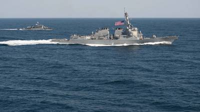 US threatens further  activity in waters claimed by China