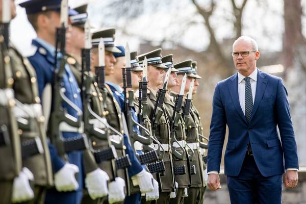 Changes to triple-lock defence protocol not ‘a big priority’, Coveney says