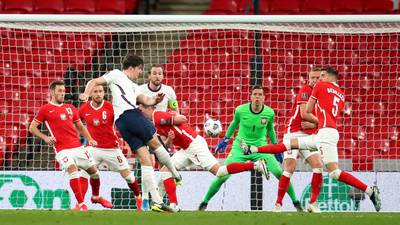 Maguire’s blast bails out Stones as England scrape nervy win over Poland