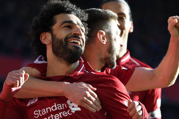 Formidable Liverpool go top after comfortable Cardiff win