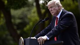 Trump advisers seek to play down growing pardon row