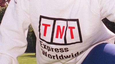 Profit warning and competition settlement hit TNT Express shares