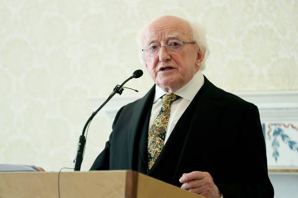Past must not disable you in present, says Higgins on North centenary