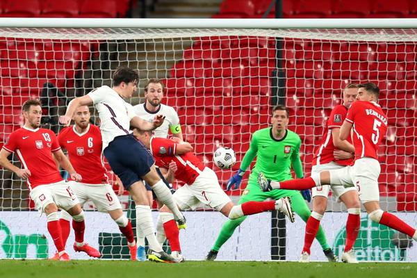 Maguire’s blast bails out Stones as England scrape nervy win over Poland