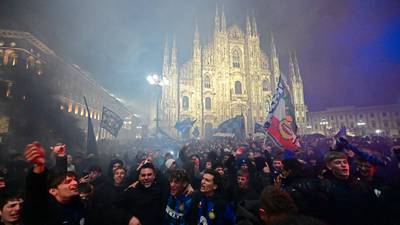 Inter fans celebrate Serie A title win in front of Milan's Duomo