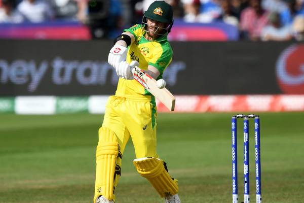 David Warner returns from ban to star for Australia in opening win