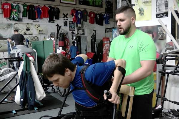 US military ‘bionic suit’ gives gift of movement to Irish paralysis victims