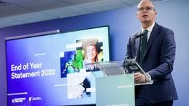 Coveney optimistic about economic outlook but warns of likely setbacks as multinationals downsize