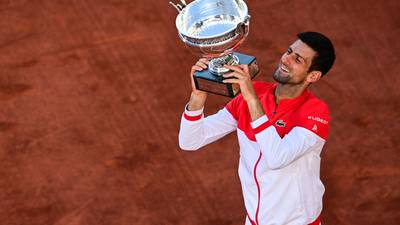 Novak Djokovic fights back from the brink to win second French Open title