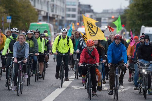 Dubliners stage slow cycle in solidarity with Extinction Rebellion