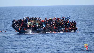 Migrant crisis: Italian navy says boat flipped, 550 rescued