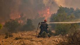 UN weather agency warns of little respite in ‘summer of extremes’ as wildfires burn Greek homes