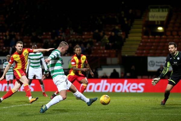 Leigh Griffiths sends Celtic 11 points clear with cool finish