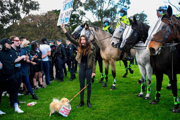 Anti-lockdown protesters confront police in Australia Covid-19 hotspot