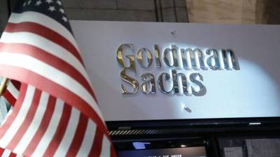 Goldman profit down on mortgage bond settlement