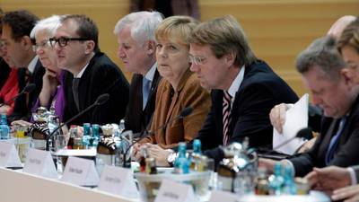 Merkel, SPD agree to renew  push for transaction tax