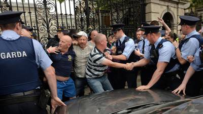 Garda knocked out at Dáil protest discharged from hospital