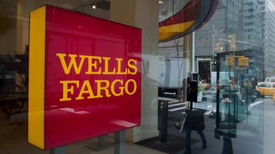 Wells Fargo reports slight profit rise, says economy improving
