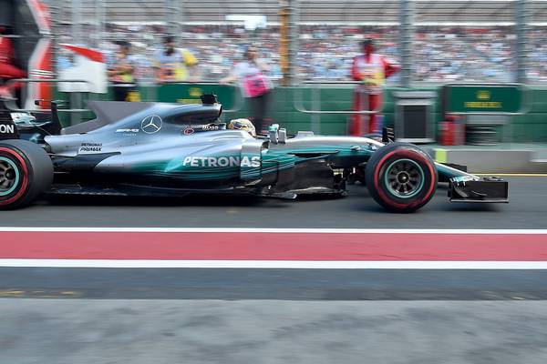 Lewis Hamilton claims season’s first pole in Australia