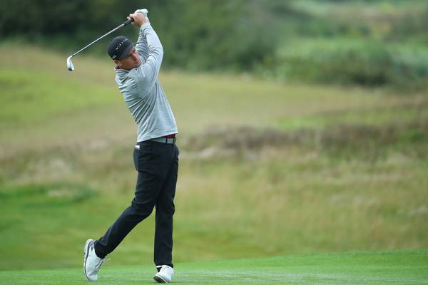 Strong wind adds bite to opening round of Wales Open