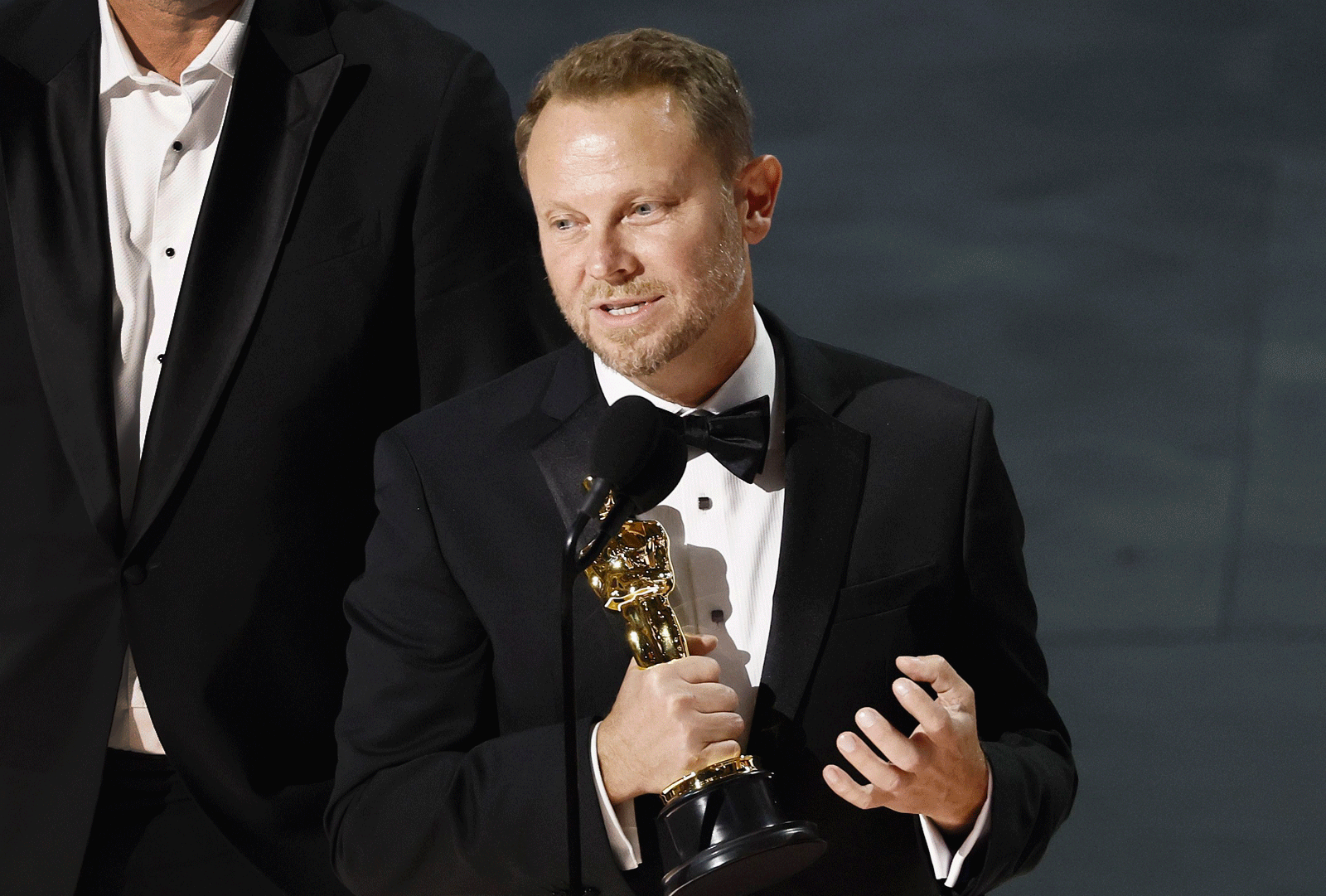 James Martin (leopard print jacket) with An Irish Goodbye’s Academy Awards for best live-action short and Richard Baneham who won the Academy Award for best visual effects for Avatar: The Way of Water who received the award along with with Eric Saindon, Daniel Barrett and Joe Letteri. Photographs: EPA