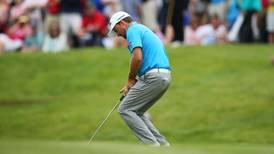 Graeme McDowell  battles cold putter to remain in contention at Irish Open