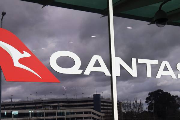 Qantas cuts more jobs and starts selling pyjamas