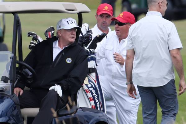 Trump takes golf break on UK visit as thousands protest